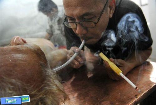 درمان سرطان توسط دود سیگار یک دکتر اندونزی+عکس