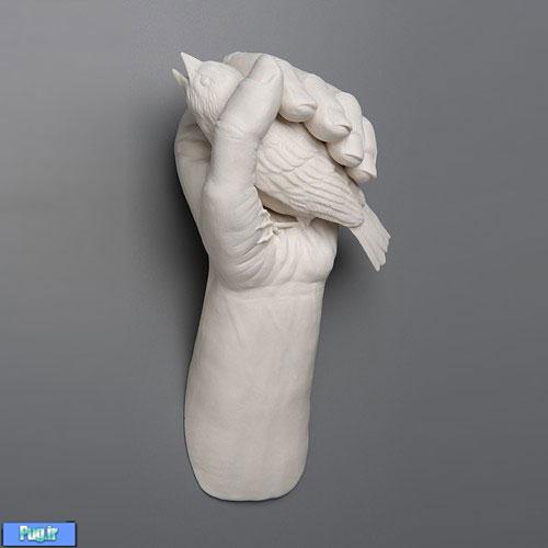 inthehand2 Porcelain Sculptures by Kate D. MacDowell